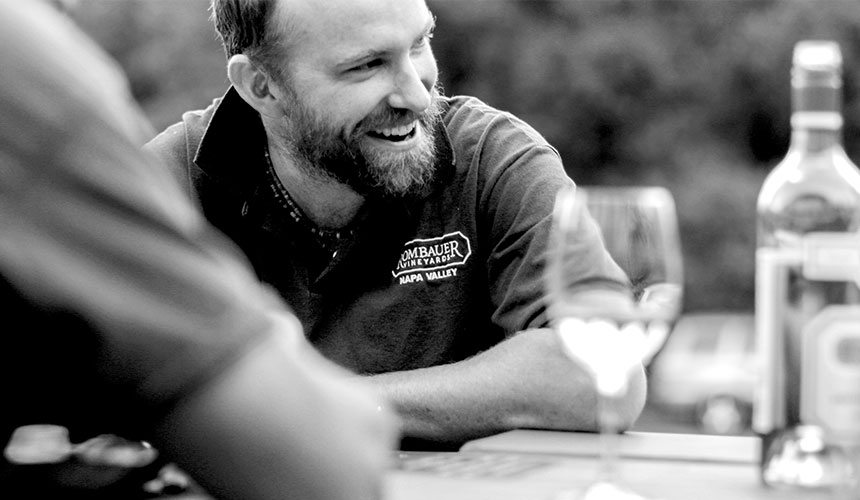 Richie Allen, legendary winemaker, smiling while at the vineyard.