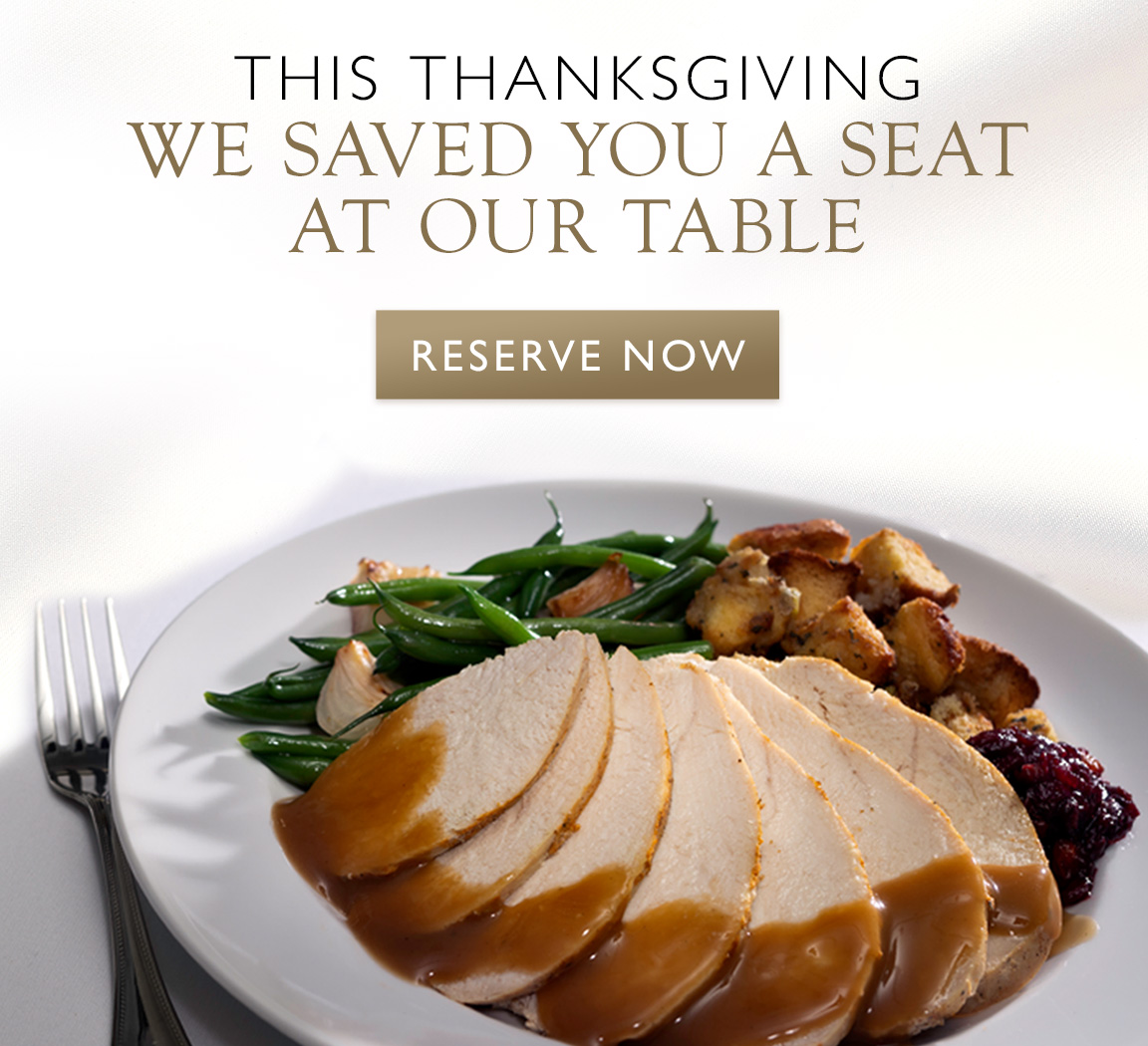 Thanksgiving dinner promotion featuring elegant table setting with seasonal decorations and premium dining experience
